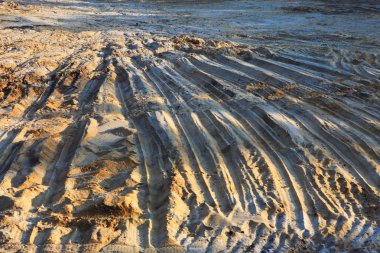 Dirt with tire tracks clipart