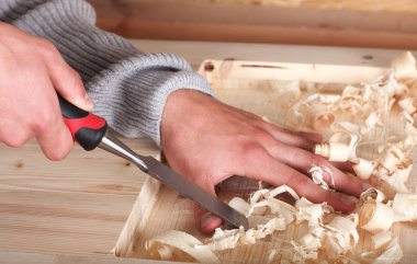 Hands in wood work clipart