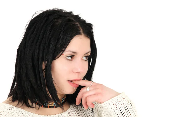 Teenage girl with finger in mouth — Stock Photo, Image