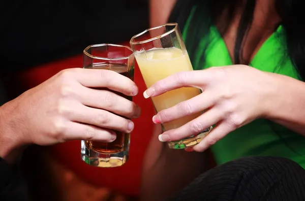 Hands with drinks — Stock Photo, Image