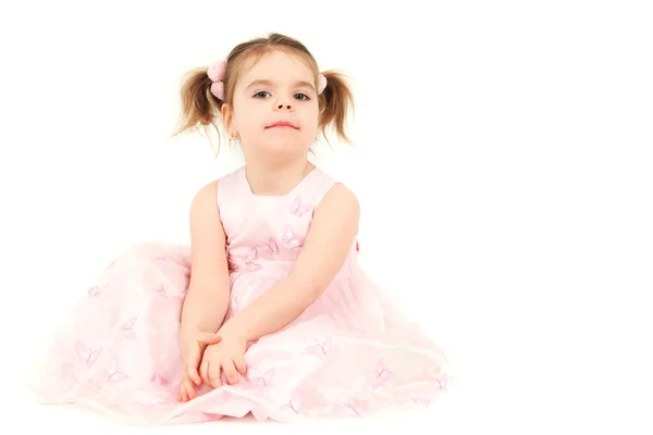 Jong meisje in roze prinses jurk — Stockfoto