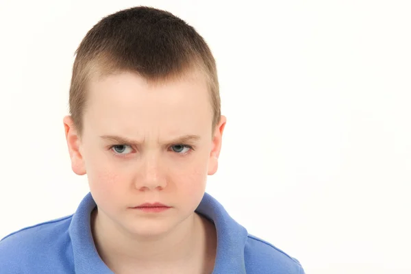 Schoolboy with depressed face — Stock Photo, Image