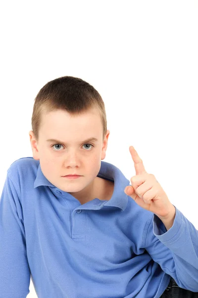 Young boy holding finger up — Stock Photo, Image