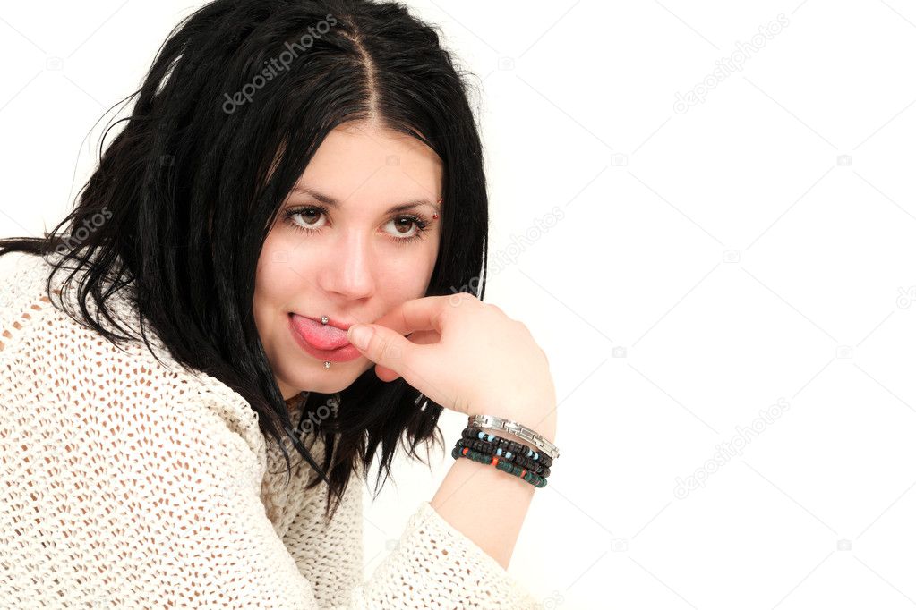 Teenage girl with tongue piercing