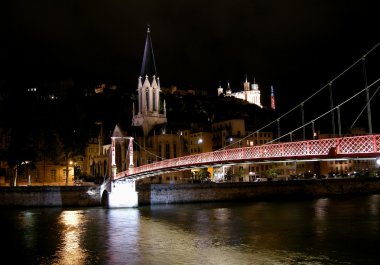 Church and footbridge by night clipart