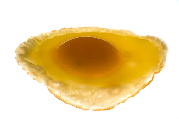 Stock image Fried egg on white