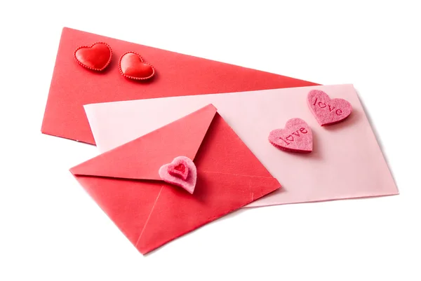 Три конверта, украшенных сердцами — стоковое фото