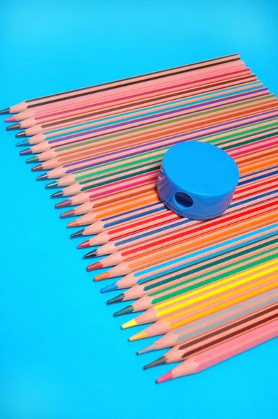 Crayons and sharpener — Stock Photo, Image