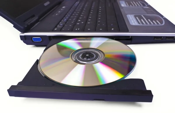 Laptop computer with open optical disk — Stock Photo, Image