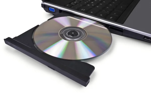 Портативный компьютер с открытым оптическим диском — стоковое фото