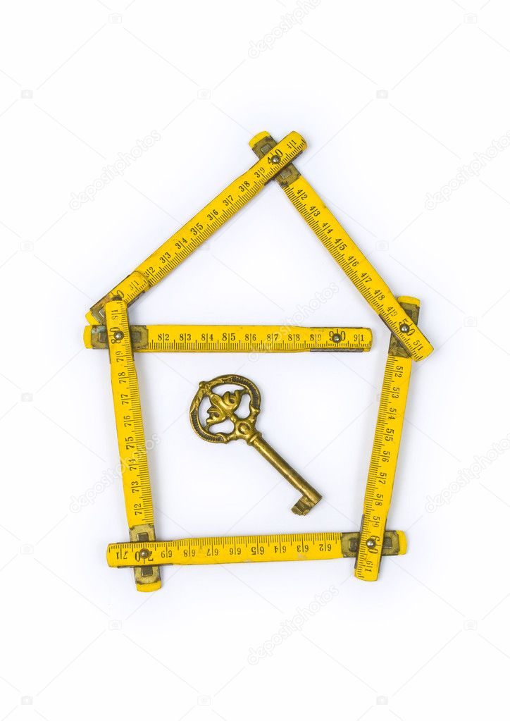 Folding ruler, house shape and key