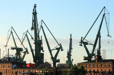 Cranes at historical shipyard in Gdansk, clipart