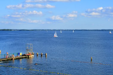 Lake and wooden pier clipart