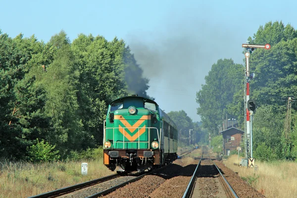 Passenger train passing through countrys — Stock Photo, Image