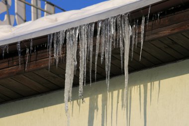 Icicles on the roof clipart