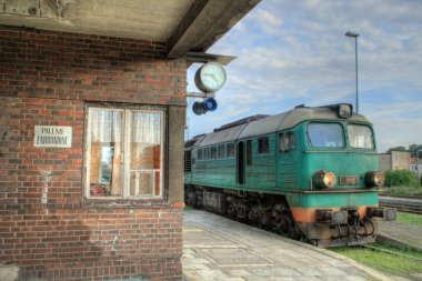 Diesel locomotive at the station clipart