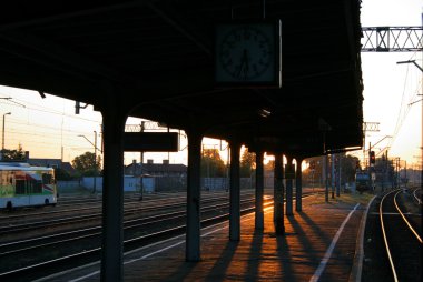 Morning scene at the railway station clipart