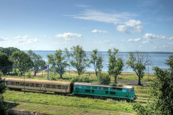 Landscape with the train and a lake — Stock Photo, Image