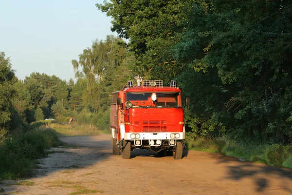 Červené hasičské auto — Stock fotografie