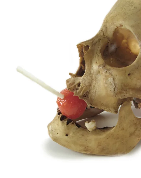 두개골과 막대 사탕 — 스톡 사진