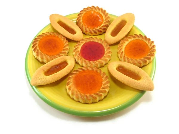 Tarts on a yellow plate — Stock Photo, Image