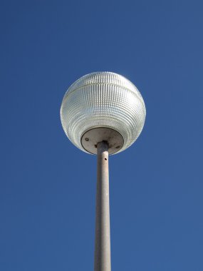 Street lamp in the blue sky clipart