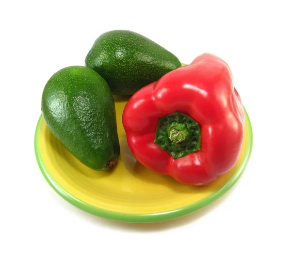 Avocado's en rode paprika — Stockfoto