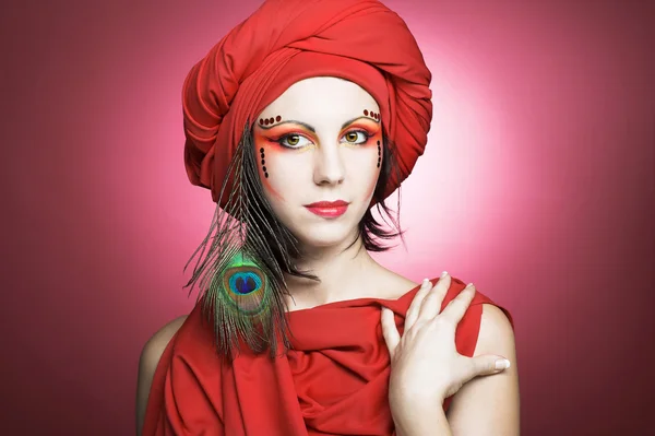 Woman in red turban — Stock Photo, Image