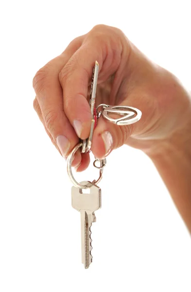 stock image Silver key in a hand