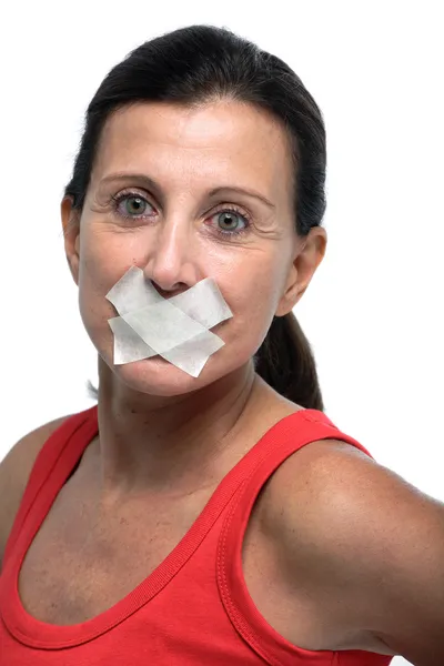 Mujer con la boca cerrada con cinta — Foto de Stock