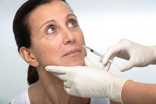 Cosmetic treatment with botox injection — Stock Photo, Image