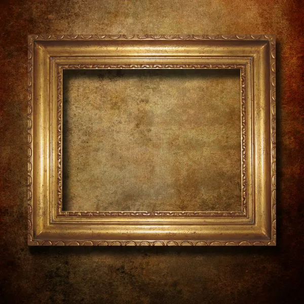 Golden frame over grunge paper — Stock Photo, Image