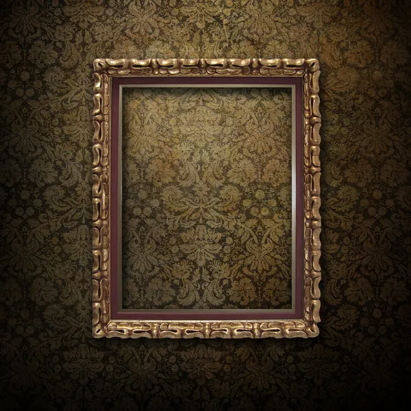 Golden frame over grunge wallpaper — Stock Photo, Image