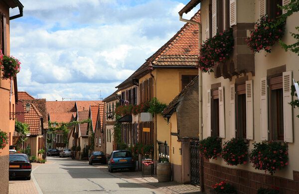 Typical colored houses in Alsace. Route des vines – France. Half-timbered wall and timber-framed construction.