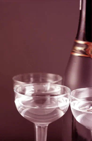 Bottle and goblets on champagne — Stock Photo, Image