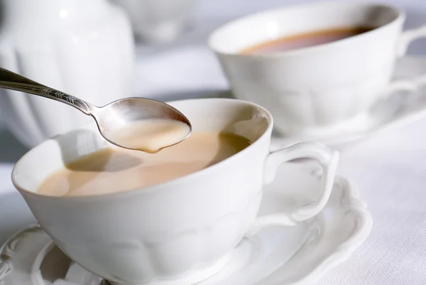 stock image Teaspoon over cup of tea or coffee
