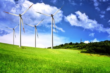 Wind farm and cloudy sky clipart