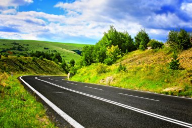 Empty road and cloudy sky clipart