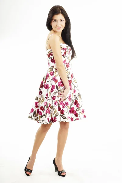 Leuk gelukkig brunette meisje dragen van een jurk — Stockfoto