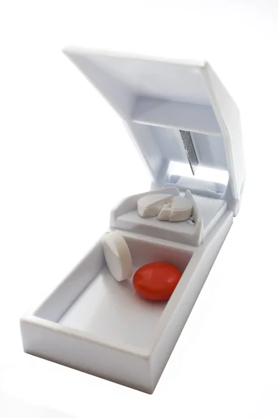 stock image White pill cutter