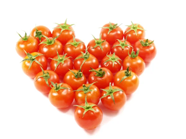 Tomates dobrados na forma de ouvir — Fotografia de Stock