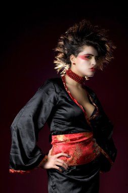 Studio shot of extreme geisha woman clipart