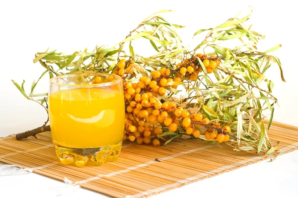 Nectar from sea-buckthorn berries — Stock Photo, Image