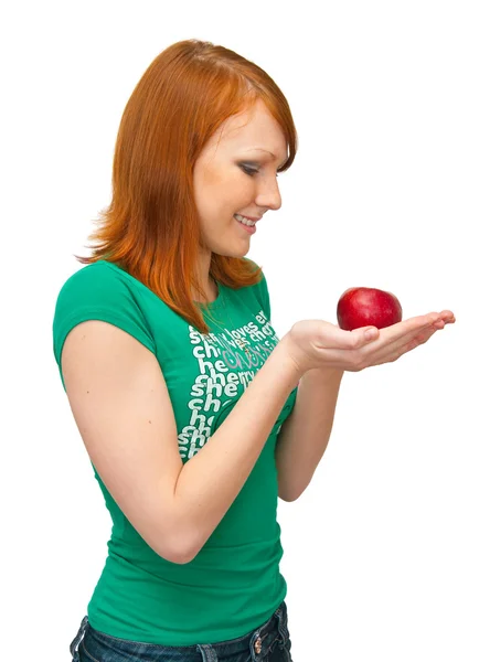 A menina segura uma maçã em palmas — Fotografia de Stock
