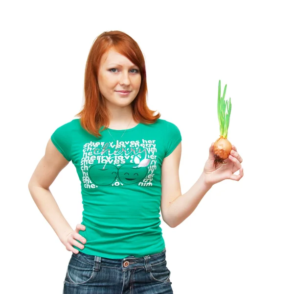 Girl and an onions. It is isolated — Stock Photo, Image