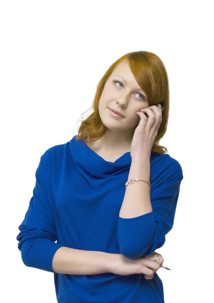 Flickan berättar med en mobiltelefon — Stockfoto