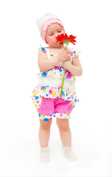 La niña con una flor —  Fotos de Stock