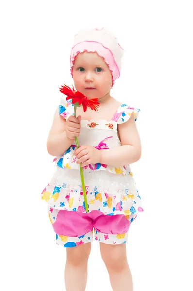 Het kleine meisje met een bloem — Stockfoto