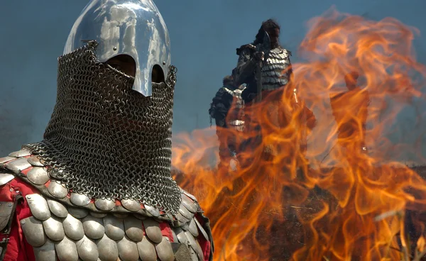Medieval knights in fire — Stock Photo, Image
