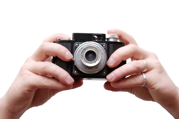 Stary aparat trzymając się za ręce — Zdjęcie stockowe